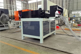 Straightening and cutting machine