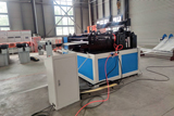 Leveling and slitting machine